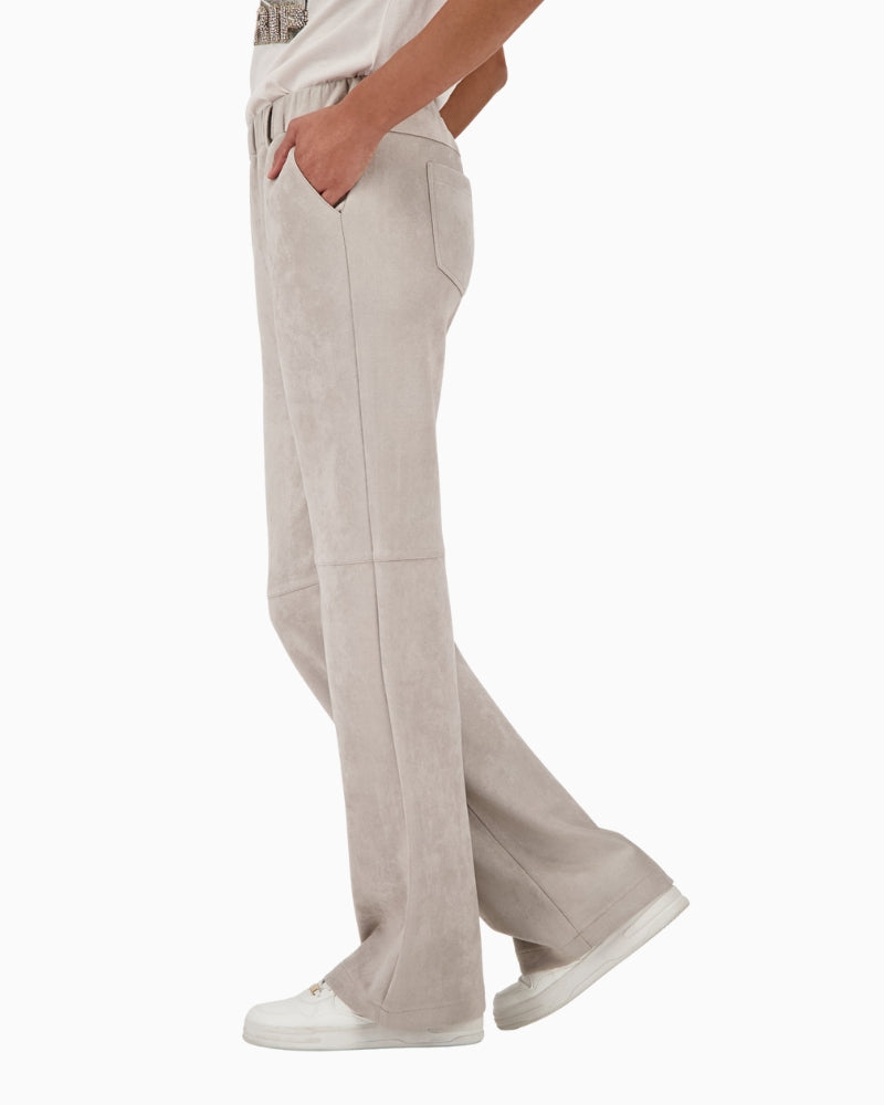 Side view showing soft stretch fabric and straight-leg shape