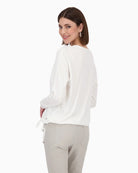 Back view of Monari white blouse in flowing viscose blend with long sleeves