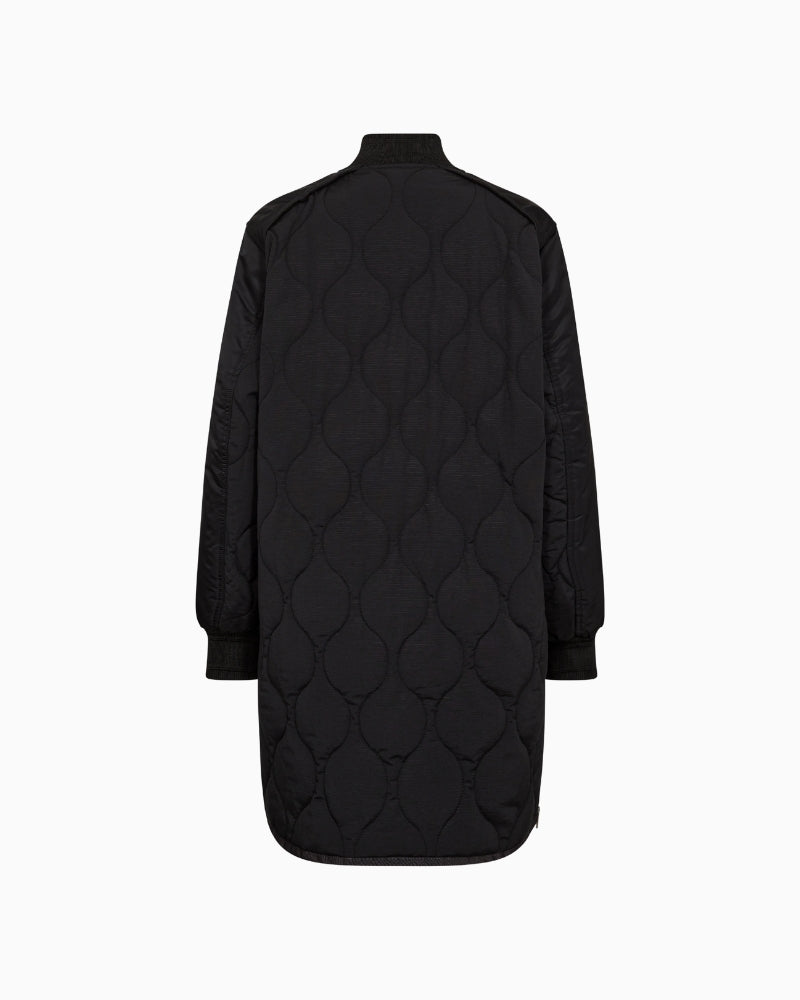 Back angle of Mos Mosh quilted jacket showing sleek fit and lightweight shape