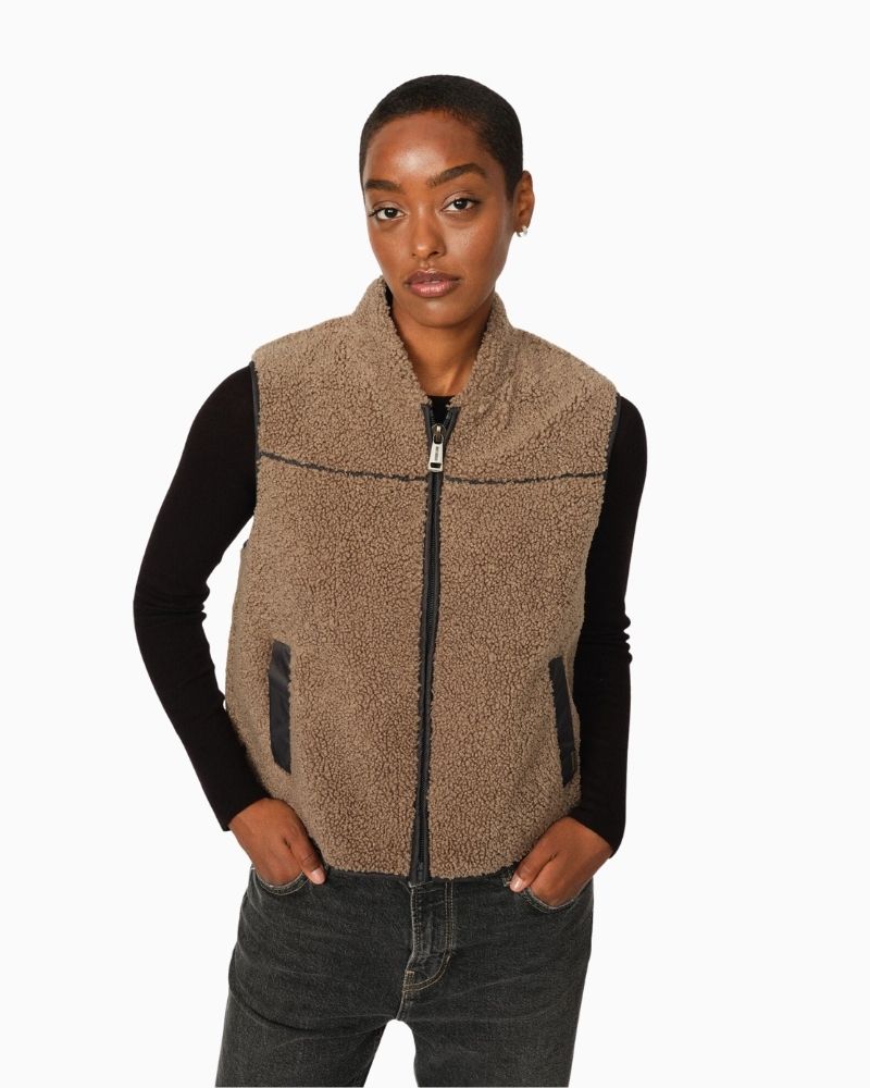 Mos Mosh teddy waistcoat in cream with contrast piping, zip front, and graphic side slits