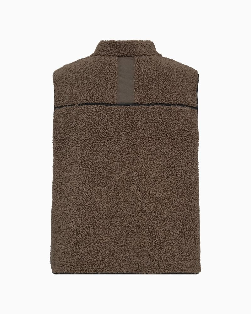 Back view of Rowe Teddy Waistcoat showing dipped hem and tape detail
