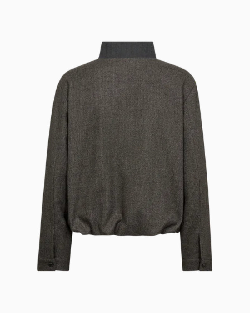 Back view of feminine Mos Mosh blouse in soft fabric blend