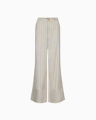 Flat lay of beige wide-leg trousers with subtle vertical stripes