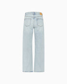 Back DangoMW jeans styled with tucked-in blouse and casual footwear