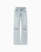 Front DangoMW jeans styled with tucked-in blouse and casual footwear