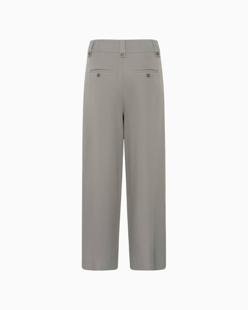 Back view showing tailored seams and relaxed leg shape