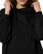 My Essential Wardrobe hoodie logo detail close-up – Áines Boutique