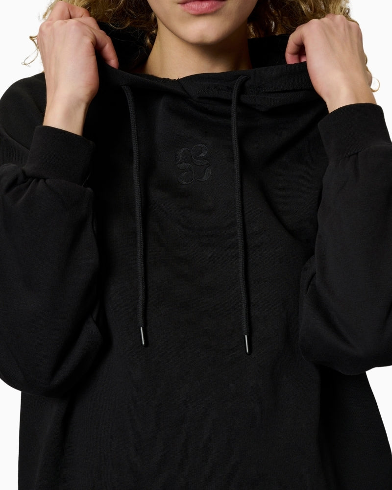 My Essential Wardrobe hoodie logo detail close-up – Áines Boutique