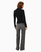 Back view of casual fit blouse with hip-length cut and long sleeves