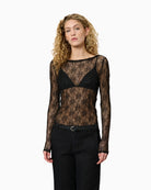 Sheer black lace blouse by My Essential Wardrobe with long sleeves
