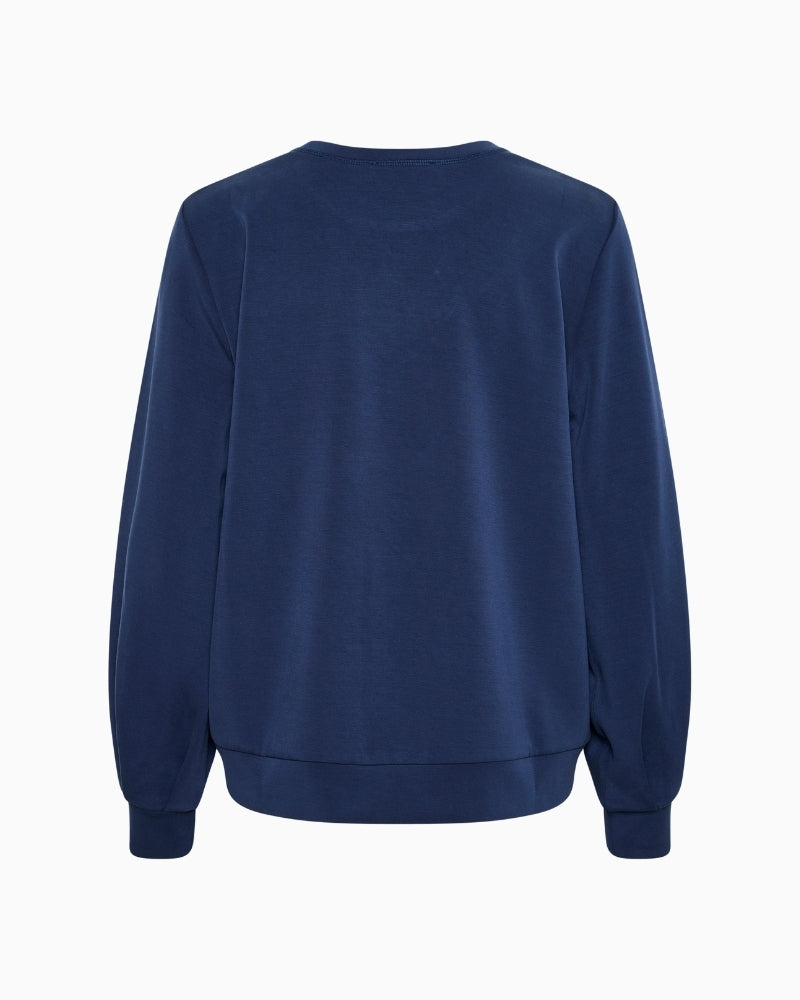 My Essential Wardrobe hip length sweat blouse back view – Áines Boutique