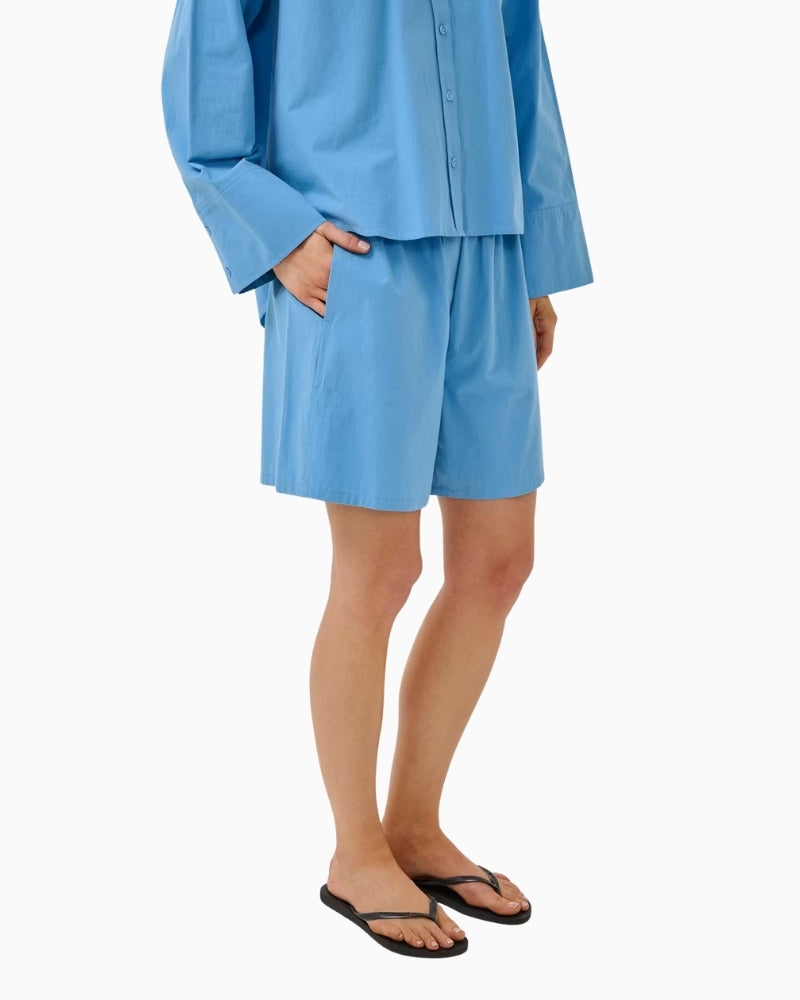 My Essential Wardrobe blue organic cotton shorts side view relaxed fit