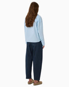 My Essential Wardrobe blue shirt back view boxy fit