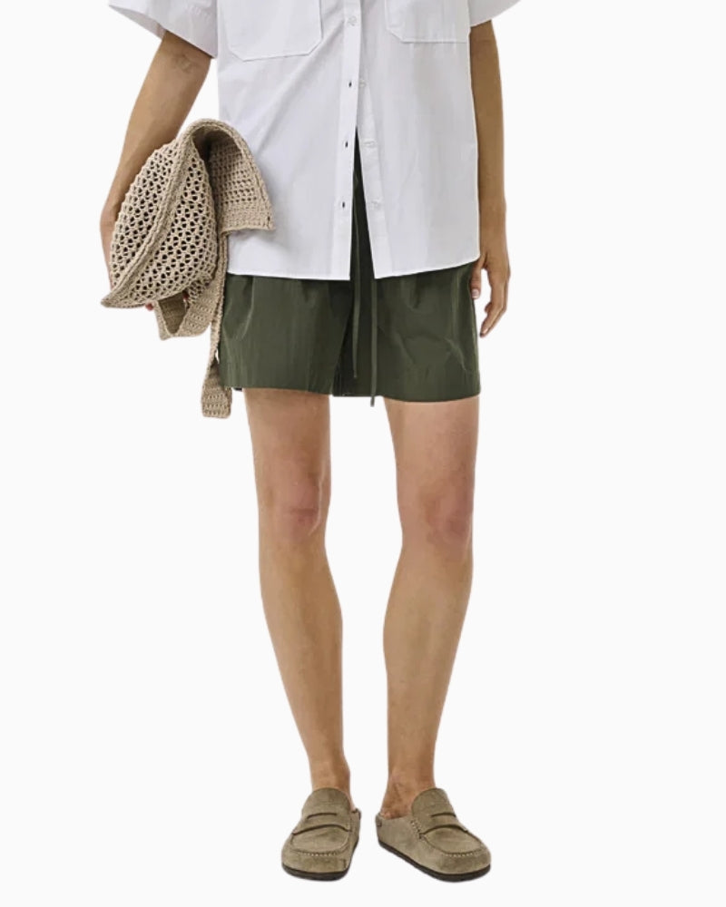 My Essential Wardrobe green drawstring shorts front view 