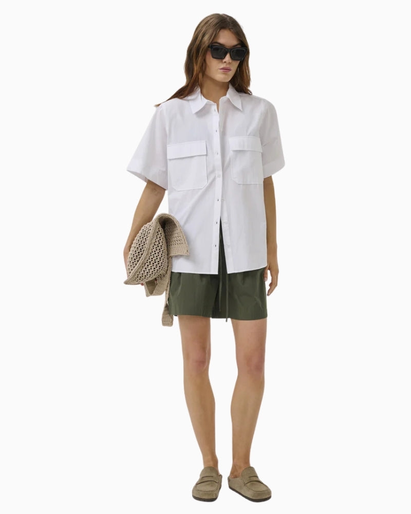 My Essential Wardrobe green relaxed fit shorts full front view