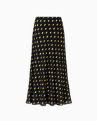Never Fully Dressed Dorris Skirt in Black back view showing gold polka dot pattern and flared hem