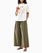 Never Fully Dressed Morocco Charms Graphic T-Shirt cream model view
