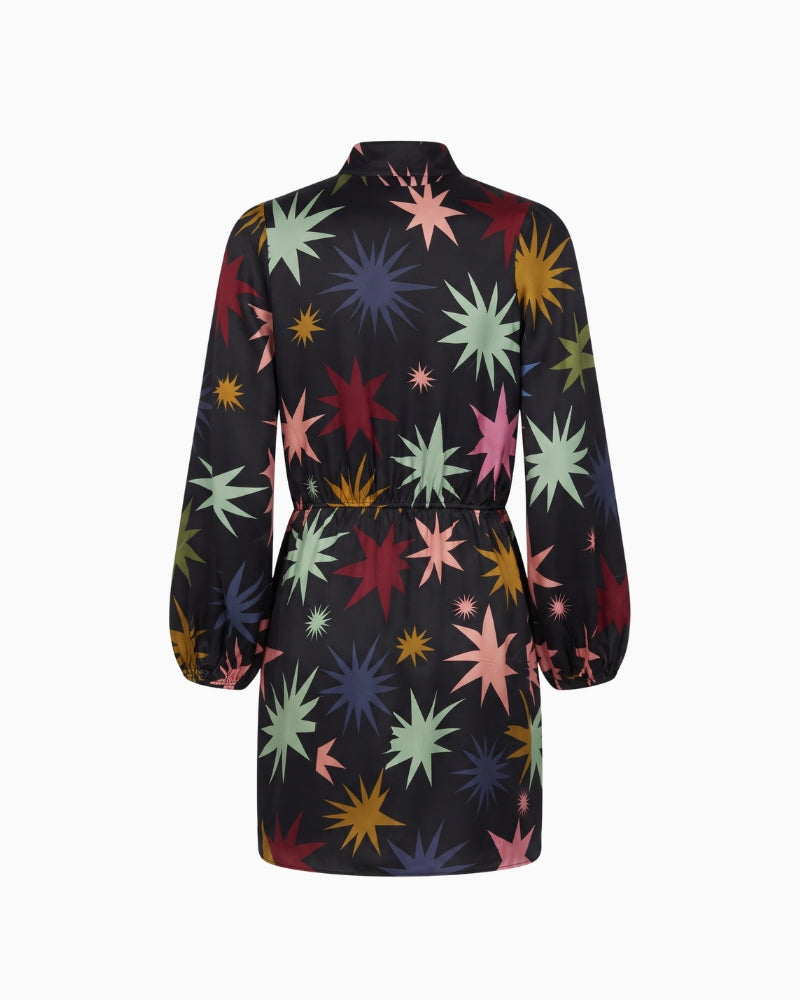 Never Fully Dressed Star Lily Mini Dress in black back view showing the starburst print