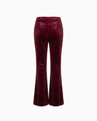 Never Fully Dressed Velvet Flared Trousers in Burgundy back view showing flared legs and velvet finish