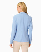 Woman wearing Olsen light blue blazer back view – Áines Boutique