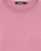 Close-up of smooth knit fabric in soft pink