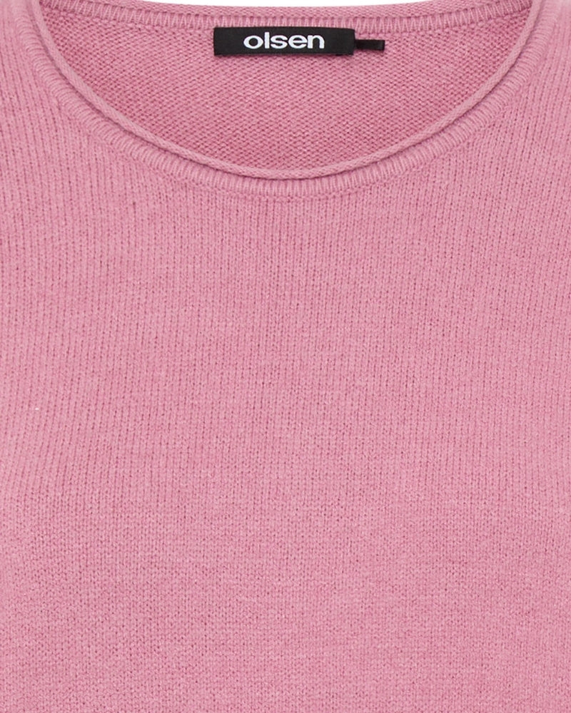 Close-up of smooth knit fabric in soft pink