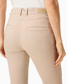 Woman wearing Olsen beige denim trousers back detail view – Áines Boutique