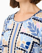 Woman wearing Olsen printed cotton top neckline and print detail – Áines Boutique