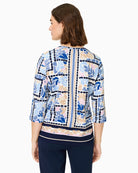 Woman wearing Olsen printed cotton top back view – Áines Boutique