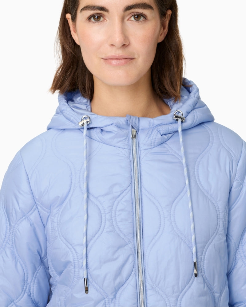 Woman wearing Olsen quilted jacket hood and zip detail – Áines Boutique