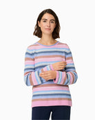 Woman wearing Olsen pink multi striped knit pullover front view – Áines Boutique