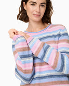 Woman wearing Olsen striped knit pullover sleeve and neckline detail – Áines Boutique