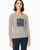 Woman wearing Olsen beige and navy striped long-sleeve top front view – Áines Boutique