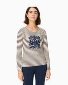 Woman wearing Olsen beige and navy striped long-sleeve top front view – Áines Boutique
