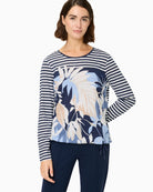 Woman wearing Olsen blue multi striped and floral long-sleeve top front view – Áines Boutique