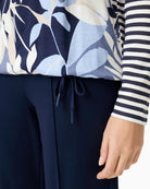 Close-up of Olsen striped and floral top hem and print detail – Áines Boutique