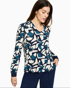 Olsen navy print long sleeve top with V-neckline and cuff detail