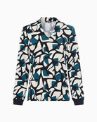 Long sleeve V-neck top in navy worn with classic trousers