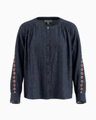 Orfeo Paris Kristin Blouse in dark denim front view with floral sleeve detailing