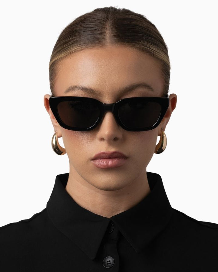 Otra Nove black cat eye sunglasses with sculpted frame and smoke lenses