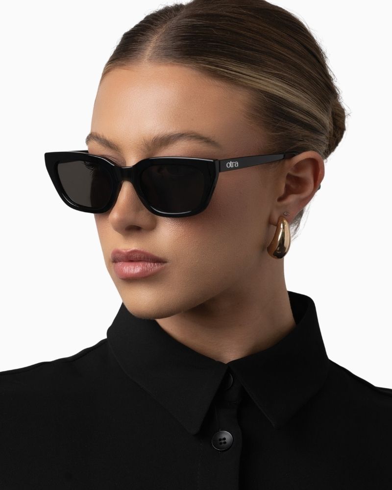 Otra Nove black cat eye sunglasses with sculpted frame and smoke lenses