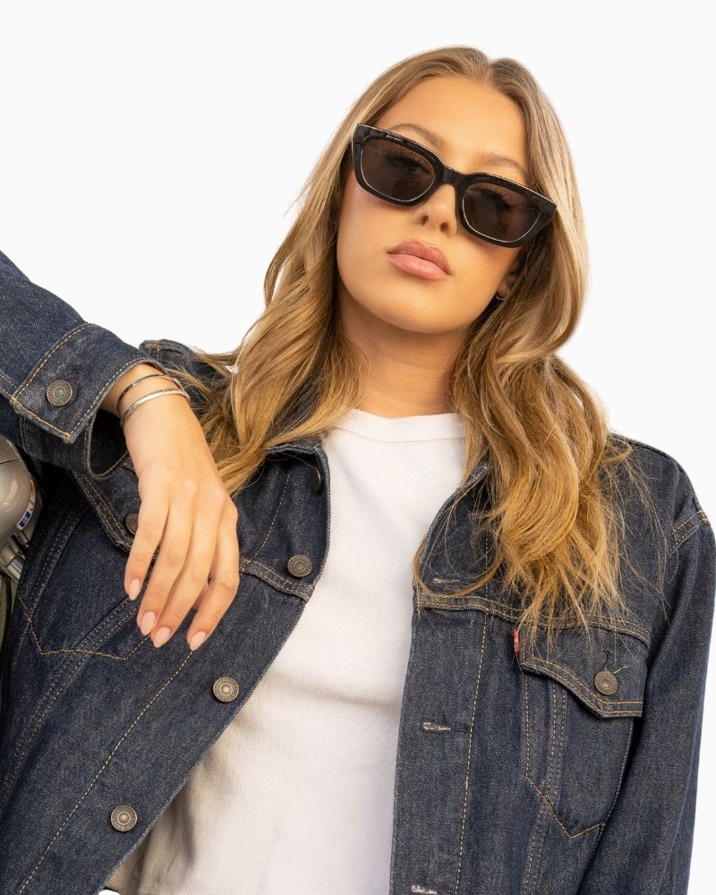 Otra Nove black cat eye sunglasses with sculpted frame and smoke lenses