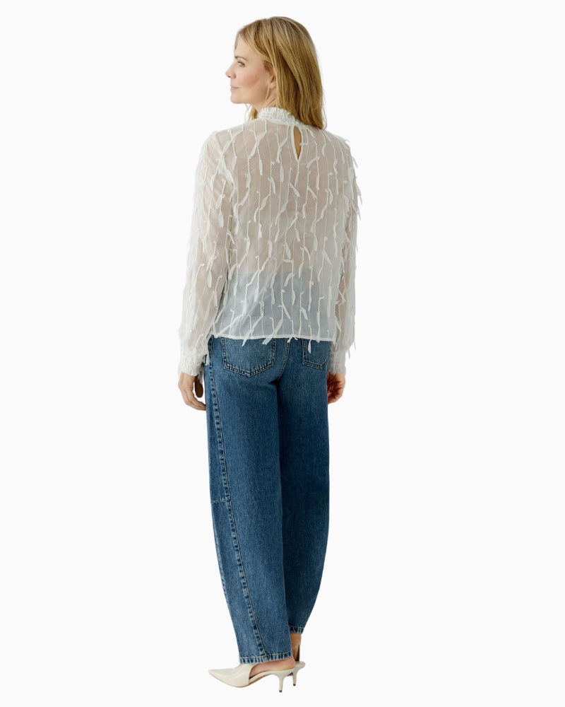 Back view of soft polyester blouse showing smooth finish