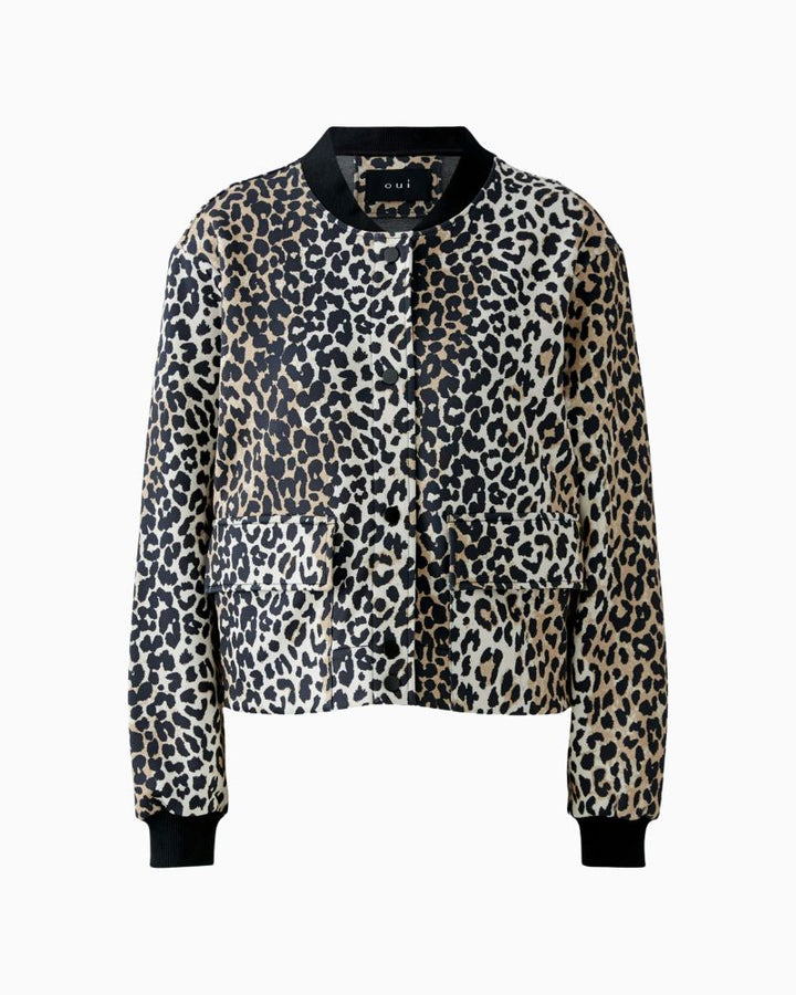 Front view of relaxed O-shape jacket showing stretch cuffs and soft scuba texture