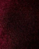 Close-up of round neckline and ribbed hem detail