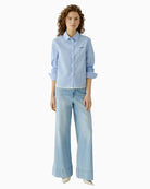 Woman wearing Oui checked shirt blouse blue and white – Áines Boutique