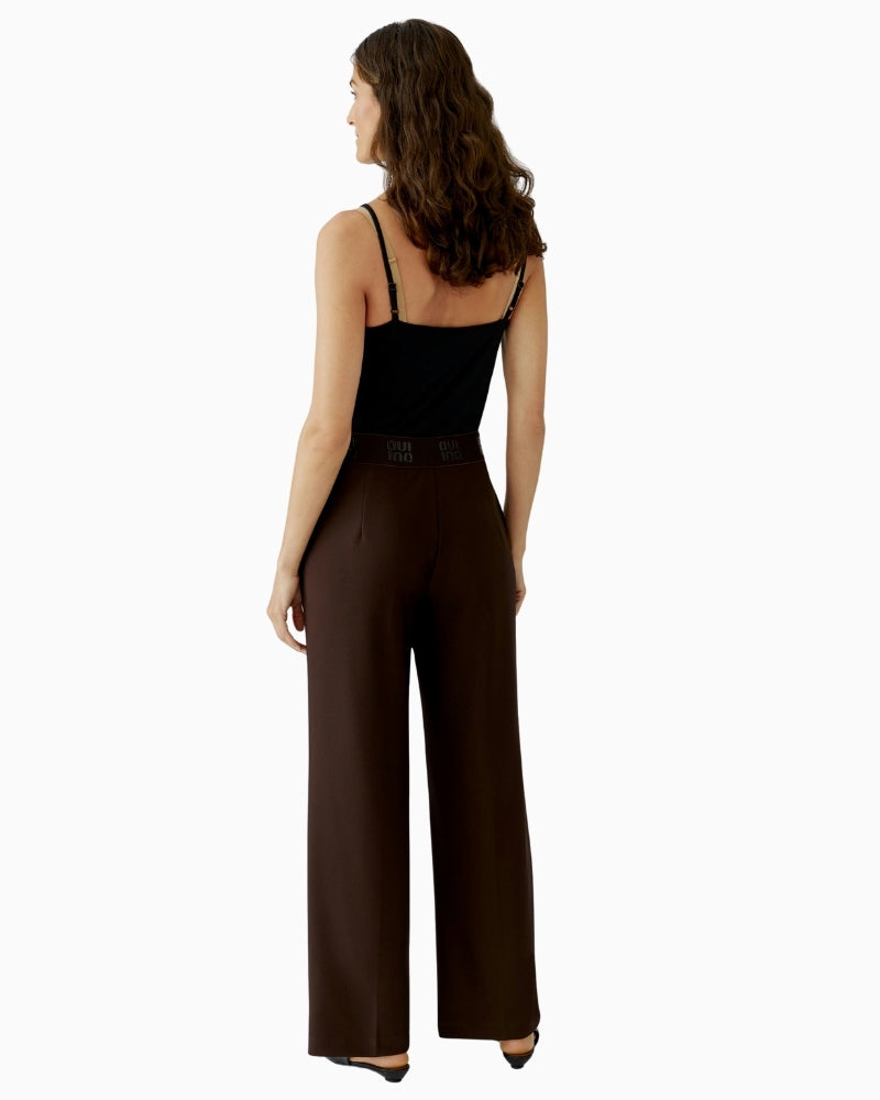 Back view of Oui trousers in technical stretch fabric