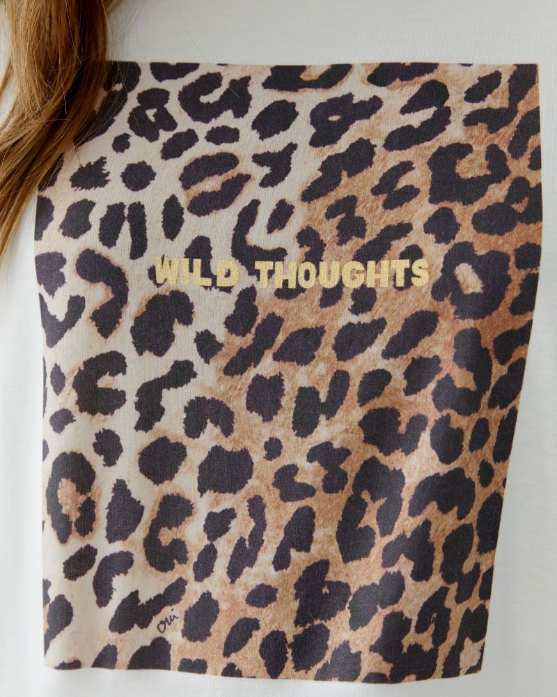 Close-up of raw edge sleeve and lightweight cotton texture