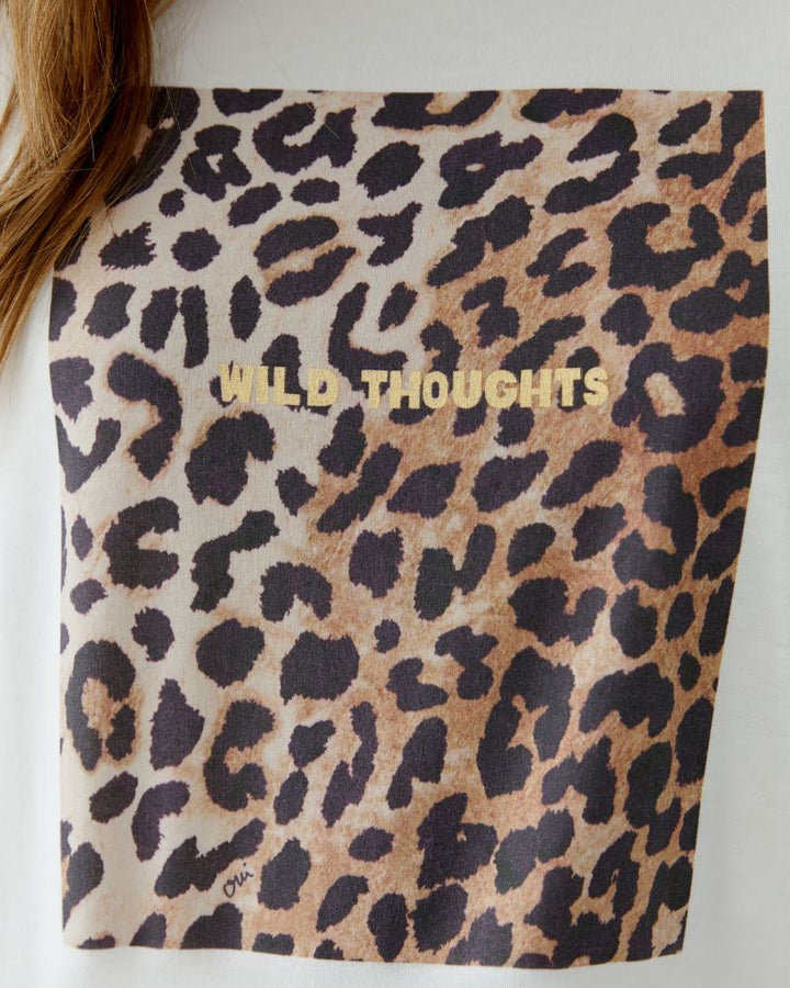 Close-up of raw edge sleeve and lightweight cotton texture
