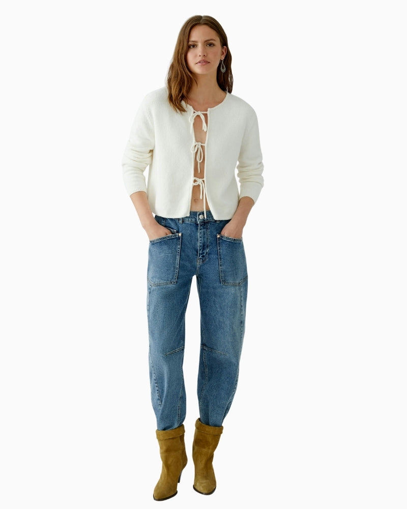 Front view of narrow cut short cardigan with round neck